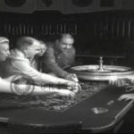 Men and women bet during a roulette game in a casino in Las Vegas, Nevada. HD Stock Footage