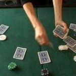 Tips for Playing Texas Holdem Hands : Dealer Button in Texas Holdem