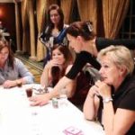 LI businesswomen learn poker