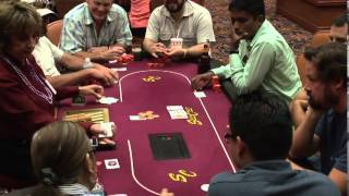 Poker Game Texas Holdem Las Vegas Casino Video of Dealer dealing Cards to Players round a Card Table